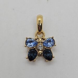 gold tone and blue rhinestone butterfly enhancer pendant